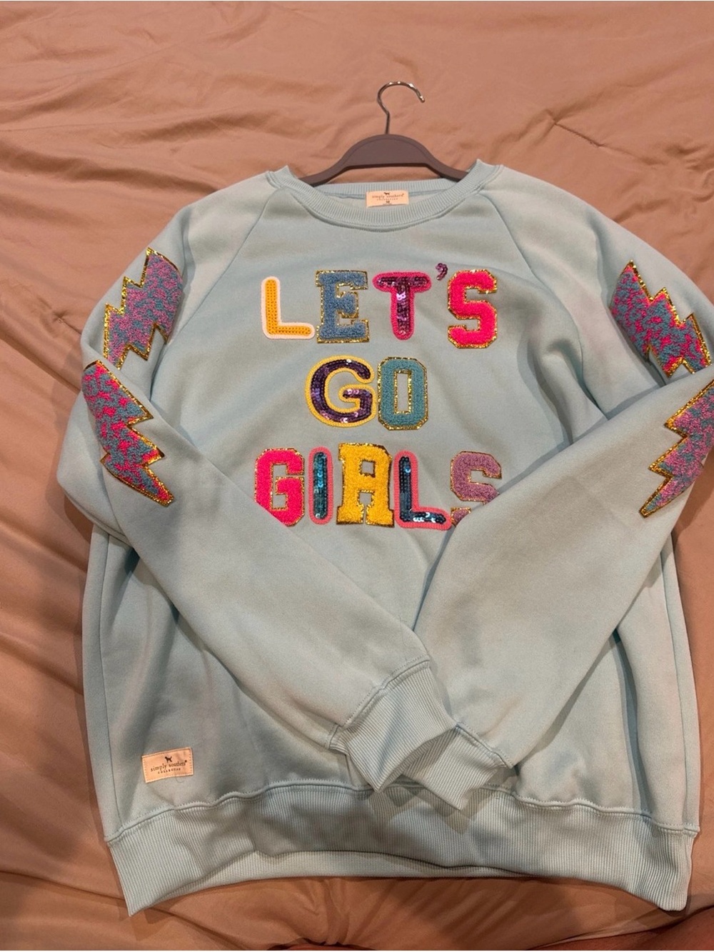 The Simply Southern "Let's Go Girls" Sweatshirt features soft, raised chenille l
